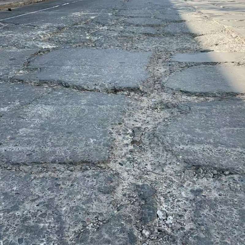 新浦路面起砂露石子修补料